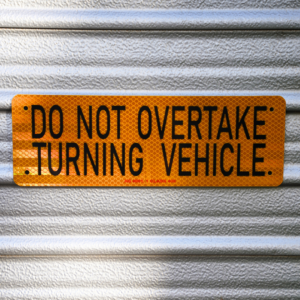 DO NOT OVERTAKE TURNING VEHICLE STICKER